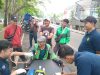Hari Bhayangkara ke-79, Polisi Layani Pemeriksaan Kesehatan Ratusan Pengemudi Ojek Online di Kota Tangerang